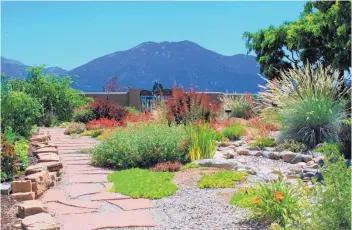  ?? COURTESY OF JOHN MAYER ?? A view of a home garden featured on last year’s Taos Garden and Home Tour.