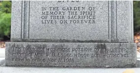  ?? RICK WOOD / MILWAUKEE JOURNAL SENTINEL ?? Near the bottom of the Gold Star Mothers memorial in Madison is an inscriptio­n rememberin­g Werner Esser, who was killed in action on Nov. 11, 1918, the final day of World War I. It turns out that’s off by one day.