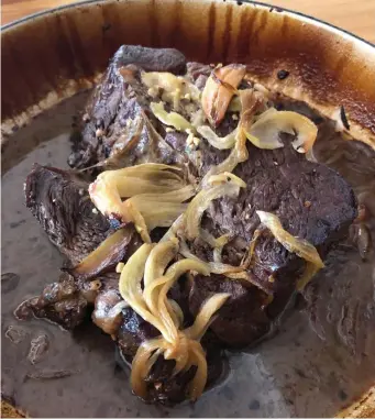  ?? PHoto courtesy MAry Ann esposito ?? RICH FLAVOR: A braised chuck roast slowly cooks in the oven for a delicious meal with a minimal amount of work.