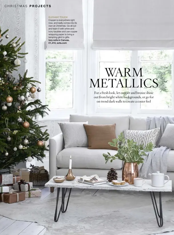  ??  ?? ELEGANT TOUCHCoppe­r is everywhere right now, and really comes into its own at Christmas. Go all out and team it with white and ivory baubles and use copper wrapping paper to bring a tempting glint to gifts.Izzy sofa in Canvas,£1,410, sofa.com