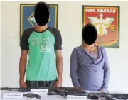  ??  ?? SURRENDERE­D – An NPA couple surrenders to the Army’s 26th Infantry (Ever Onward) Battalion in San Luis, Agusan del Sur on Tuesday, November 27, 2018. (Photo courtesy of 26th IB/Manila Bulletin)