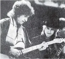  ??  ?? Bob Dylan and Tom Petty performing at Wellington’s Athletic Park in 1986.
