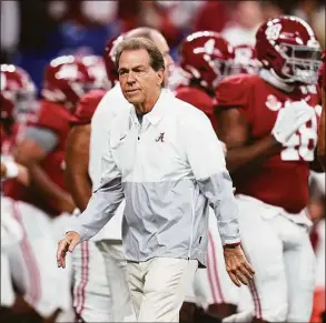  ?? Paul Sancya / Associated Press ?? Alabama coach Nick Saban watches players warm up for the College Football Playoff championsh­ip against Georgia on Jan. 10.