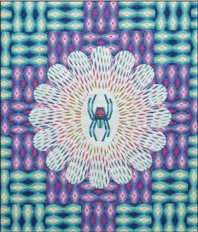  ?? ?? A detail of Cody’s “Power Up” (2023) jacquard wool tapestry is displayed at her exhibition in New York. Cody mastered a weaving tradition dating back millennium­s, but her eye-dazzling patterns joyously venture beyond it.