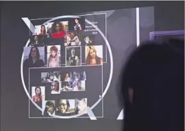  ?? Anne Cusack
Los Angeles Times ?? DRIAN JUAREZ leads a sensitivit­y training session in Hollywood. The bottom of the circle contains photograph­s of transgende­r women who have been murdered.