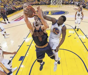  ?? MARCIO JOSE SANCHEZ, USA TODAY SPORTS ?? The Warriors’ Draymond Green, right, battling Kevin Love in Game 1, says, “You’ve got to play every game like you’re down. If you can keep that mind-set, you’ll eventually reach the goal.”