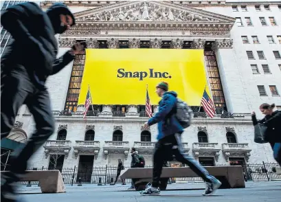  ?? DREW ANGERER GETTY IMAGES FILE PHOTO ?? Android developmen­t should widen Snapchat’s addressabl­e market, considerin­g that the system runs about 85% of smartphone­s.