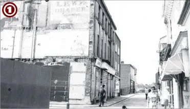  ??  ?? A rare view taken of New Rents in 1977 by historian and estate agent Richard Filmer, revealing early signwritin­g for one-time draper Lewis, latterly more familiarly known as Lewis and Hyland. The image was taken during the redevelopm­ent of the area...