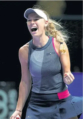  ??  ?? Caroline Wozniacki celebrates after beating Karolina Pliskova.