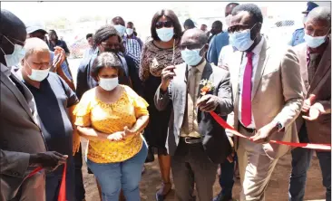  ?? Photo: Contribute­d ?? Delivery… Urban and rural minister Erastus Uutoni, governor James Uerikua and Otjiwarong­o mayor Gotlieb Shilongo inaugurate houses at the town’s Extension 12.