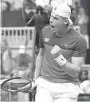  ?? JON BLACKER, THE CANADIAN PRESS ?? Denis Shapovalov is pumped up after a five-set win over Robin Haase of the Netherland­s on Friday in Toronto.