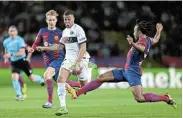  ?? Picture: DAVID RAMOS/GETTY IMAGES ?? FOR THE GLORY: Kylian Mbappe of Paris Saint-Germain is challenged by Jules Kounde of Barcelona in their Uefa Champions League quarterfin­al, second leg match in Barcelona