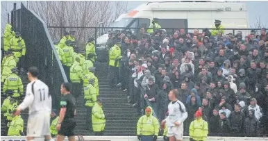  ??  ?? Flashpoint Police separate fans during the last Ayrshire derby at Somerset Park in 2009