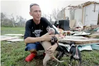  ?? — AP ?? A man in tears after damage to his home in Rockport, Texas.