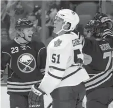  ?? GARY WIEPERT/THE ASSOCIATED PRESS ?? Leafs’ Jake Gardiner can’t believe the score after the Sabres scored late.