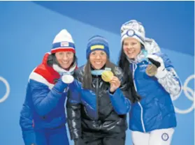  ??  ?? Charlotte Kalla, Marit Bjoergen i Krista Parmakoski s medaljama