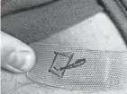  ?? JULIA DECKER ?? The author scored a personaliz­ed bandage after his second shot of the Pfizer COVID-19 vaccine.