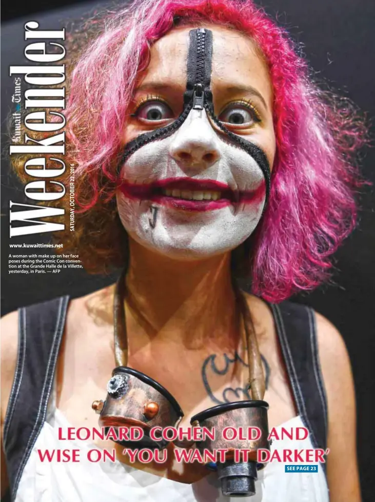  ?? — AFP ?? A woman with make up on her face poses during the Comic Con convention at the Grande Halle de la Villette, yesterday, in Paris.