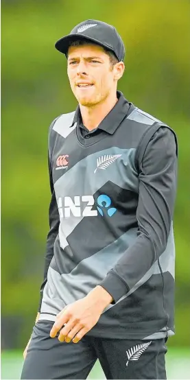  ?? Photo / Getty Images ?? Mitchell Santner proved hard to get away and took three wickets for the Black Caps in an elongated T20 internatio­nal.