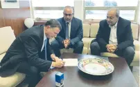  ?? (Courtesy) ?? KNESSET SPEAKER Yuli Edelstein (left) receives the resignatio­n of Joint List lawmaker Osama Saadi (center) yesterday as MK Ahmad Tibi looks on.