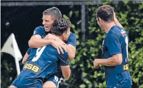  ?? Photos: PHOTOSPORT.CO.NZ ?? Happy times: Darren White celebrates scoring City’s second goal in stoppage time.