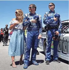  ?? PETER CASEY, USA TODAY SPORTS ?? The exit of Dale Earnhardt Jr., center, with crew chief Greg Ives and wife Amy, will open a slot at Hendrick Motorsport­s.