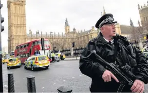  ??  ?? ●●The Houses of Parliament and surroundin­g area was sealed off within minutes of the attack