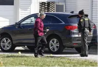  ?? BILL LACKEY / STAFF ?? The Clark County Sheriff’s department investigat­es a shooting at a home in the 7000 block of South Charleston-clifton Road Monday.