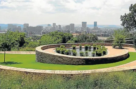  ??  ?? TWISTS OF FATE: Landscaped gardens and spiral pathways lend to the beauty of Freedom Park