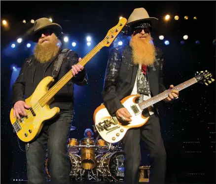  ?? THE ASSOCIATED PRESS ?? Dusty Hill, left and Billy Gibbons bring their band ZZ Top to San Jose’s City National Civic Sunday.