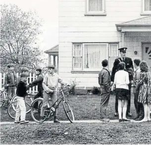  ?? DOUGLAS GLYNN TORONTO STAR FILE PHOTO ?? In May 1968, after stories of the "Etobicoke poltergeis­t" surfaced, about 200 children descended on the Sunnylea neighbourh­ood to demand the ghost reveal itself.