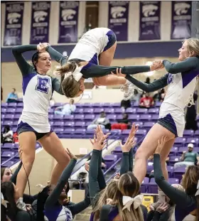  ?? Southern Sass/Special to News-Times ?? DEGrEE oF DIFfiCulty: El Dorado's cheerleade­rs perform a stunt during the basketball game against White Hall. El Dorado will compete in the state cheerleadi­ng competitio­n on Saturday in Hot Springs in the 5-6A Game Day Division.