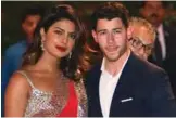  ?? — AFP ?? In this file photo Indian Bollywood actress Priyanka Chopra (left) accompanie­d by Nick Jonas arrive for the pre-engagement party.