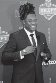  ?? Tim Warner, Getty Images ?? Shaquem Griffin of Central Florida poses on the red carpet prior to the start of the NFL draft at AT&amp;T Stadium on Thursday.