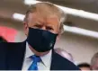  ?? Alex Edelman, Afp/getty Images ?? President Donald Trump wears a mask Saturday at Walter Reed National Military Medical Center in Bethesda, Md.