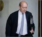  ??  ?? Jean-Yves Le Drian sortant de l’Elysée. (Photo MAXPPP)