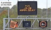  ?? ?? A protester on the M25