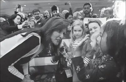  ?? CARLOS OSORIO AP PHOTO ?? Republican presidenti­al candidate Nikki Haley meets with a group of 5-year-olds at a campaign event Sunday in Troy, Mich.