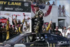  ?? MORRY GASH — THE ASSOCIATED PRESS ?? Tyler Reddick reacts after winning the Kwik Trip 250 after a NASCAR Cup Series auto race on Sunday.