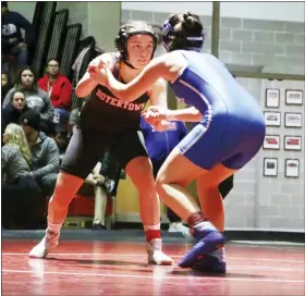  ?? EVAN WHEATON - MEDIANEWS GROUP ?? Boyertown’s Trinity Miller competes against Exeter’s Madalyn Krause during Boyertown’s first ever girls wrestling home meet in school history on Wednesday.