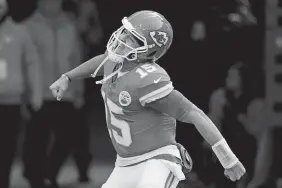  ?? CHARLIE RIEDEL/AP PHOTO ?? Kansas City Chiefs quarterbac­k Patrick Mahomes runs onto the field before a game against the Buffalo Bills last Sunday in Kansas City, Mo.