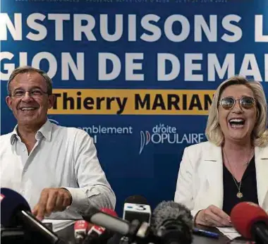  ?? Foto: AFP ?? Marine Le Pen und Regionalka­ndidat Thierry Mariani bei einer Pressekonf­erenz in Toulon.