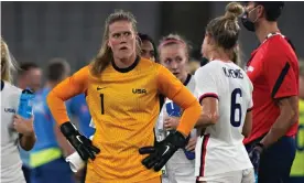  ?? Richard Ellis/UPI/REX/Shuttersto­ck ?? Alyssa Naeher takes in USA’s defeat to Sweden in their opening game at the Olympics. Photograph: