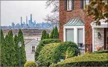  ?? TONY CENICOLA / THE NEW YORK TIMES ?? The Manhattan skyline is seen from Hasbrouck Heights, N.J. Working from home and out of state could lead to surprise state tax liabilitie­s for some, experts say.