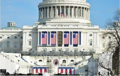  ?? (Reuters) ?? PREPARATIO­NS ARE FINALIZED on the West Front of the US Capitol, where Donald J. Trump will be sworn in as America's 45th president on Friday.