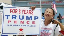  ?? AP PHOTO/ALAN DIAZ ?? A pro President Donald Trump supporter chants slogans, Friday in Miami.