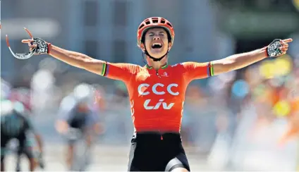  ??  ?? First rate: Marianne Vos celebrates her victory in La Course