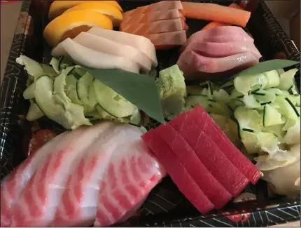  ?? (Arkansas Democrat-Gazette/Eric E. Harrison) ?? The chef supplies thick slices of the fish in the Chef’s Select sashimi plate from Ocean’s at Arthur’s.