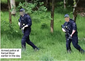  ?? ?? Armed police at Kersal Moor earlier in the day