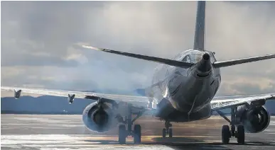  ?? DARIO AYALA/MONTREAL GAZETTE FILES ?? Because of a quirk of the 1997 Kyoto Protocol, internatio­nal aviation emissions are treated separately from national emissions commitment­s, Chris Lyle says.